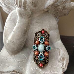 Bronze tribal type stone ring.